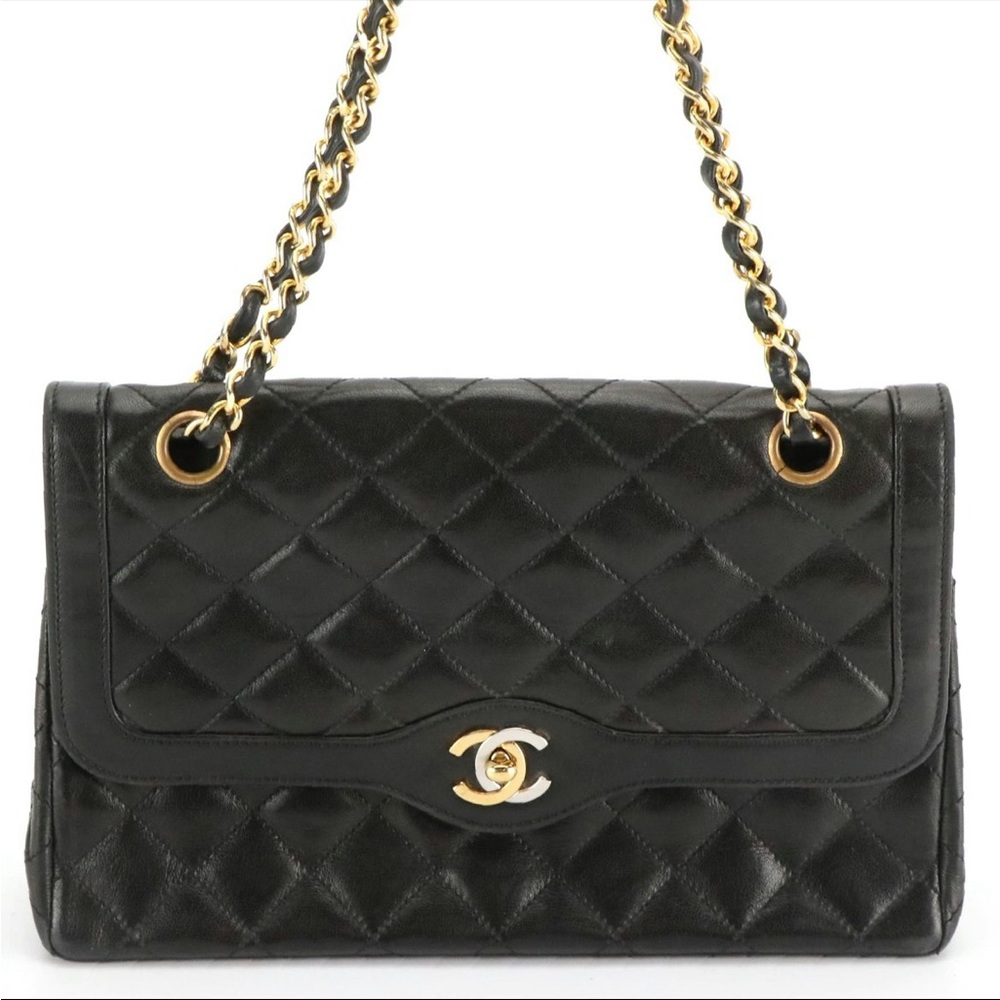 CHANEL
BLACK QUILTED LAMBSKIN PARIS LIMITED DOUBLE FLAP MEDIUM